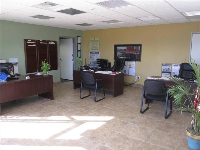 Front office with desks and filing cabinets